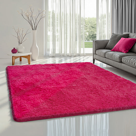 Tapis Fluff fuchsia doux à poils long